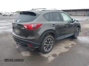 ✅ 2016 Mazda CX-5 Grand Touring • VIN: JM3KE4DY2G0763608 • Lot: 43864275. Wystawiony na IAAI z przebiegiem 95 452 mil. Bezpłatny archiwum sprzedaży aukcyjnych z USA i szczegółowy raport historii pojazdu na DreamBid. Zdjęcie 4.