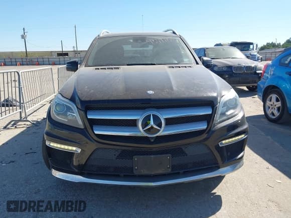 ✅ 2015 Mercedes-Benz GL 550 • VIN: 4JGDF7DE6FA552454 • Лот: 43497155. Опубликован ранее на IAAI с пробегом 139 467 миль. Бесплатный доступ к архиву аукционных продаж из США и подробный отчёт об истории автомобиля на DreamBid. Изображение 12.