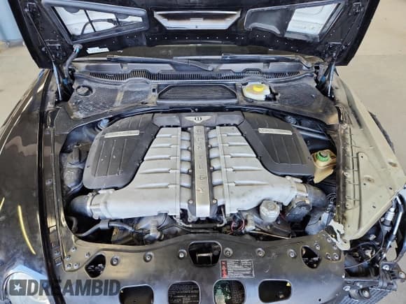 ✅ 2008 Bentley Continental GT • VIN: SCBCR73W88C057877 • Лот: 89504025. Опубликован ранее на Copart с пробегом 80 413 миль. Бесплатный доступ к архиву аукционных продаж из США и подробный отчёт об истории автомобиля на DreamBid. Изображение 11.