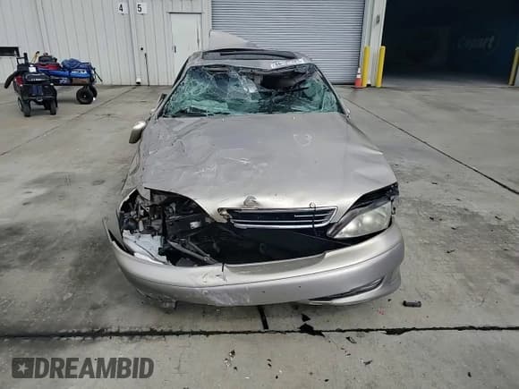 ✅ 2000 Lexus ES 300 • VIN: JT8BF28G3Y0250444 • Lot: 86487625. Listed on Copart with 176,051 mi. Free auction sales archive from the USA and detailed vehicle history report at DreamBid. Image 14.