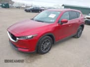✅ 2021 Mazda CX-5 Touring • VIN: JM3KFBCM4M0437448 • Lot: 43560635. Wystawiony na IAAI z przebiegiem 41 044 mil. Bezpłatny archiwum sprzedaży aukcyjnych z USA i szczegółowy raport historii pojazdu na DreamBid. Zdjęcie 2.