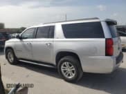 ✅ 2015 Chevrolet Suburban LS • VIN: 1GNSCHKC7FR120590 • Lot: 60042815. Listed on Copart with 183,407 mi. Free auction sales archive from the USA and detailed vehicle history report at DreamBid. Image 2.