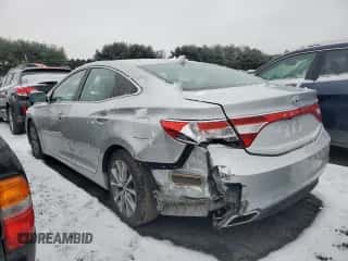 2016 Hyundai Azera z VIN KMHFG4JG1GA506784, wystawiony jako Copart lot #84911744 z przebiegiem 88 057 mil mil oraz Szkoda całkowita • Salvage title. Historia ofert i sprzedaży dostępna na DreamBid. Obrazek 2.
