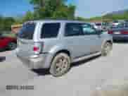 2010 Mercury Mariner with VIN 4M2CN9BG0AKJ21754, listed as a IAAI auction lot 42192286 with 196,749 mi miles and . Bid and sale history available at DreamBid. Image 4.