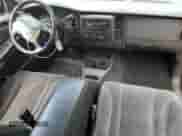 2004 Dodge Dakota Sport z VIN 1D7GL32K64S573944, wystawiony jako Copart lot #65445125 z przebiegiem 159 375 mil mil oraz Szkoda całkowita • Salvage title. Historia ofert i sprzedaży dostępna na DreamBid. Obrazek 8.