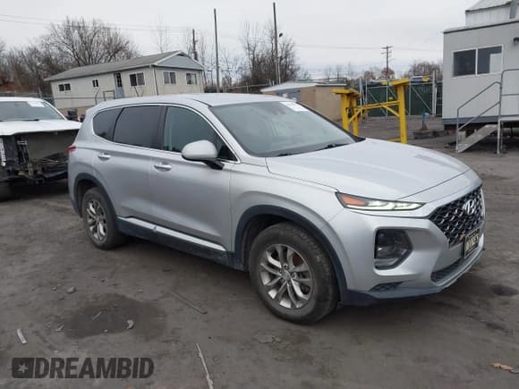 ✅ 2019 Hyundai Santa Fe SE • VIN: 5NMS2CAD7KH054274 • Lot: 43694931. Listed on IAAI with 96,329 mi. Free auction sales archive from the USA and detailed vehicle history report at DreamBid. Image 1.