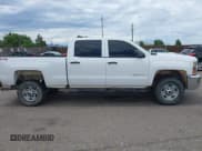 ✅ 2018 Chevrolet Silverado 2500HD Work Truck • VIN: 1GC1KUEG4JF271444 • Lot: 42588159. Listed on IAAI with 210,808 mi. Free auction sales archive from the USA and detailed vehicle history report at DreamBid. Image 13.