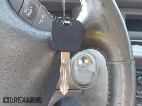 ✅ 1998 Lincoln Mark VIII • VIN: 1LNFM91V9WY713398 • Lot: 43369799. Listed on IAAI with 182,027 mi. Free auction sales archive from the USA and detailed vehicle history report at DreamBid. Image 11.