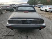 ✅ 1996 Jaguar XJS • VIN: SAJNX2740TC225643 • Лот: 80975784. Опубликован ранее на Copart с пробегом 98 427 миль. Бесплатный доступ к архиву аукционных продаж из США и подробный отчёт об истории автомобиля на DreamBid. Изображение 6.