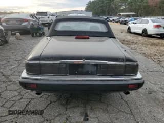 ✅ 1996 Jaguar XJS • VIN: SAJNX2740TC225643 • Лот: 80975784. Опубликован ранее на Copart с пробегом 98 427 миль. Бесплатный доступ к архиву аукционных продаж из США и подробный отчёт об истории автомобиля на DreamBid. Изображение 6.