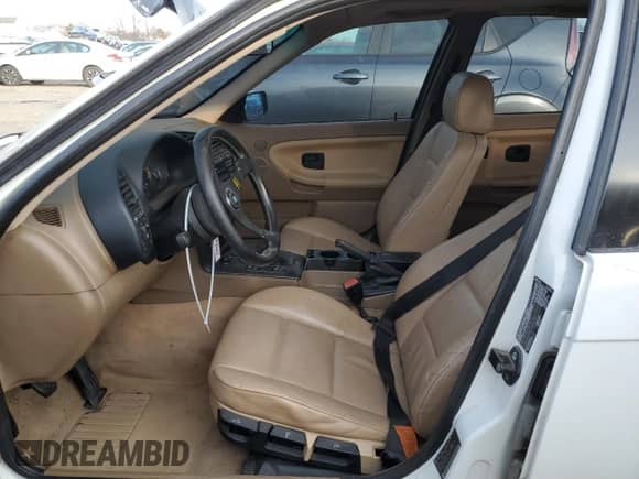 1996 BMW 3 Series z VIN 4USCD7322TLC50315, wystawiony jako Copart lot #87952885 z przebiegiem 318 396 mil mil oraz Szkoda całkowita • Salvage title. Historia ofert i sprzedaży dostępna na DreamBid. Obrazek 7.