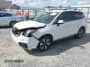 2017 Subaru Forester Limited with VIN JF2SJAJC1HH414553, listed as a IAAI auction lot 43289933 with 120,913 mi miles and . Bid and sale history available at DreamBid. Image 2.