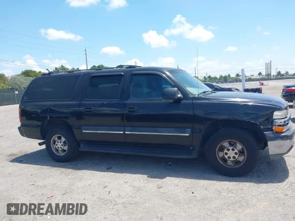 ✅ 2003 Chevrolet Suburban LT • VIN: 3GNEC16ZX3G334147 • Lot: 42150897. Listed on IAAI with 193,120 mi. Free auction sales archive from the USA and detailed vehicle history report at DreamBid. Image 13.