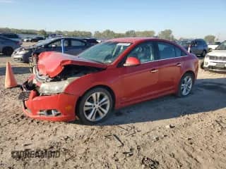 2012 Chevrolet Cruze LTZ z VIN 1G1PH5SC6C7189446, wystawiony jako Copart lot #82202375 z przebiegiem 214 240 mil mil oraz Szkoda całkowita • Salvage title. Historia ofert i sprzedaży dostępna na DreamBid. Obrazek 1.