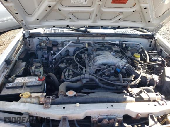 ✅ 1999 Nissan Frontier XE • VIN: 1N6ED26Y4XC303405 • Lot: 82285355. Wystawiony na Copart z przebiegiem 126 617 mil. Bezpłatny archiwum sprzedaży aukcyjnych z USA i szczegółowy raport historii pojazdu na DreamBid. Zdjęcie 11.