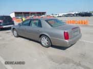 ✅ 2003 Cadillac DeVille • VIN: 1G6KD54Y43U151482 • Lot: 43140962. Wystawiony na IAAI z przebiegiem 101 641 mil. Bezpłatny archiwum sprzedaży aukcyjnych z USA i szczegółowy raport historii pojazdu na DreamBid. Zdjęcie 3.