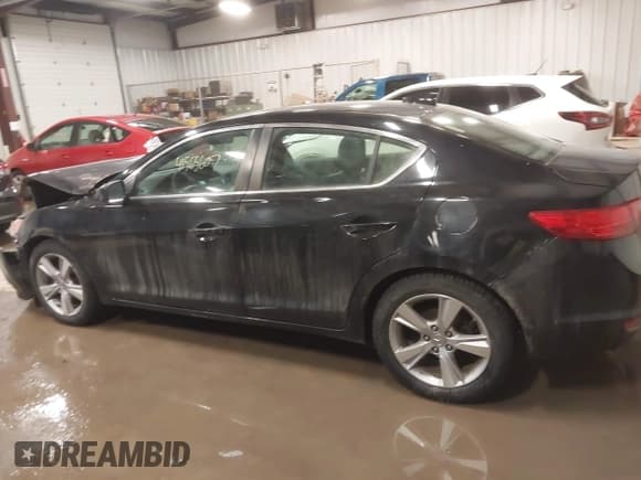 ✅ 2014 Acura ILX • VIN: 19VDE1F34EE009141 • Lot: 41565607. Listed on IAAI with 130,029 mi. Free auction sales archive from the USA and detailed vehicle history report at DreamBid. Image 14.