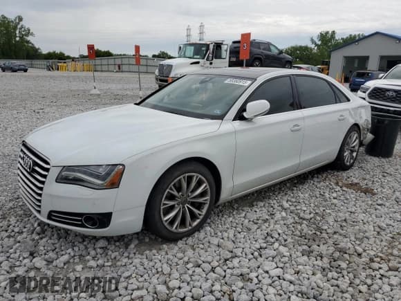 ✅ 2012 Audi A8 • VIN: WAURVAFD7CN020369 • Лот: 58360915. Опубликован ранее на Copart с пробегом 158 824 миль. Бесплатный доступ к архиву аукционных продаж из США и подробный отчёт об истории автомобиля на DreamBid. Изображение 1.