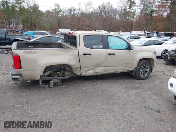 ✅ 2022 Chevrolet Colorado 4WD Z71 • VIN: 1GCGTDEN8N1296338 • Lot: 43591648. Listed on IAAI with 60,426 mi. Free auction sales archive from the USA and detailed vehicle history report at DreamBid. Image 13.