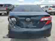 2014 Toyota Camry L with VIN 4T1BF1FKXEU306687, listed as a Copart auction lot 55024825 with 209,979 mi miles and Clean title. Bid and sale history available at DreamBid. Image 6.