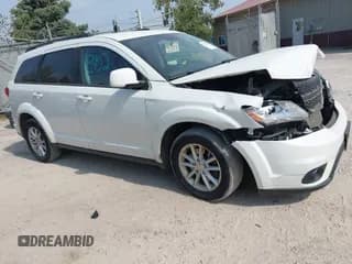 ✅ 2014 Dodge Journey SXT • VIN: 3C4PDDBG3ET301795 • Lot: 43258452. Listed on IAAI with 191,140 mi. Free auction sales archive from the USA and detailed vehicle history report at DreamBid. Image 1.