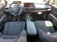 2025 Toyota Prius SE с VIN JTDACACU6S3046868, выставлен на аукционе Copart как лот 69399085 с пробегом 269 миль миль и Списание • Salvage title. История ставок и продаж доступна на DreamBid. Изображение 8.