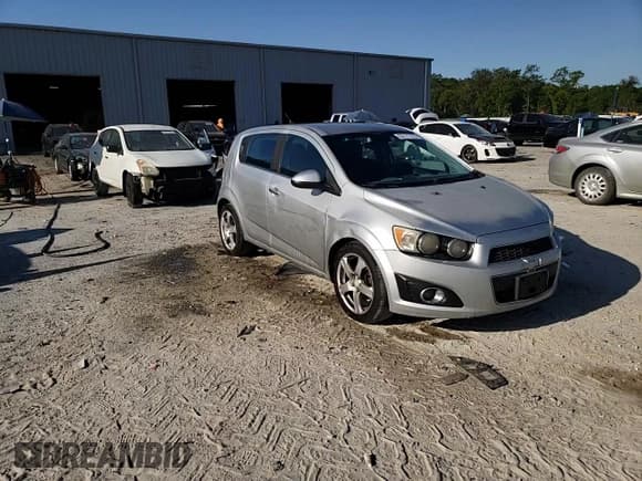 ✅ 2012 Chevrolet Sonic LTZ • VIN: 1G1JE6SH4C4101608 • Lot: 53111725. Listed on Copart with 203,012 mi. Free auction sales archive from the USA and detailed vehicle history report at DreamBid. Image 13.
