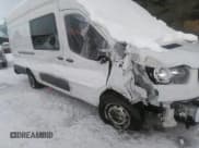 ✅ 2021 Ford Transit Cargo • VIN: 1FTBW3X89MKA61149 • Lot: 41520778. Wystawiony na IAAI z przebiegiem Nie podano. Bezpłatny archiwum sprzedaży aukcyjnych z USA i szczegółowy raport historii pojazdu na DreamBid. Zdjęcie 6.