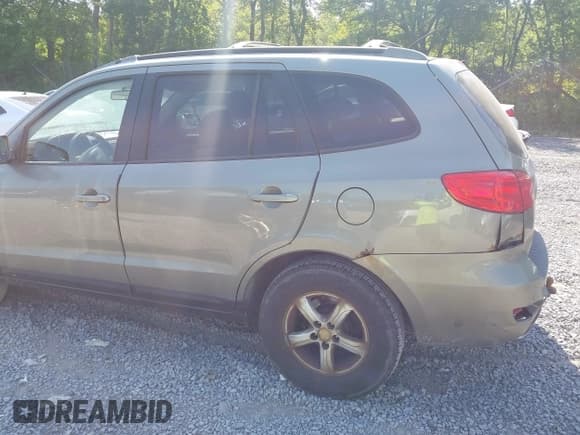 ✅ 2007 Hyundai Santa Fe GLS • VIN: 5NMSG73D37H002895 • Lot: 42977578. Listed on IAAI with 214,757 mi. Free auction sales archive from the USA and detailed vehicle history report at DreamBid. Image 6.