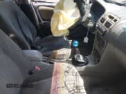 ✅ 2002 Toyota Corolla CE • VIN: 2T1BR12E12C529401 • Лот: 42559679. Опубликован ранее на IAAI с пробегом 226 111 миль. Бесплатный доступ к архиву аукционных продаж из США и подробный отчёт об истории автомобиля на DreamBid. Изображение 5.