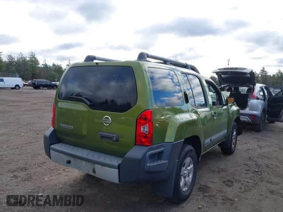 ✅ 2011 Nissan Xterra X • VIN: 5N1AN0NW6BC520316 • Lot: 43626819. Listed on IAAI with 99,017 mi. Free auction sales archive from the USA and detailed vehicle history report at DreamBid. Image 4.