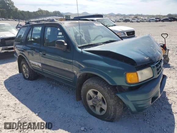 ✅ 1999 Isuzu Rodeo S • VIN: 4S2CM58W4X4330190 • Lot: 81996975. Wystawiony na Copart z przebiegiem 167 032 mil. Bezpłatny archiwum sprzedaży aukcyjnych z USA i szczegółowy raport historii pojazdu na DreamBid. Zdjęcie 4.