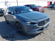 ✅ 2023 Mazda CX-30 S Carbon Edition • VIN: 3MVDMBCM1PM557862 • Lot: 41966734. Listed on IAAI with 36,757 mi. Free auction sales archive from the USA and detailed vehicle history report at DreamBid. Image 1.
