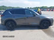 ✅ 2024 Mazda CX-5 Premium • VIN: JM3KFBDY6R0396572 • Lot: 42254785. Listed on IAAI with 21,425 mi. Free auction sales archive from the USA and detailed vehicle history report at DreamBid. Image 13.