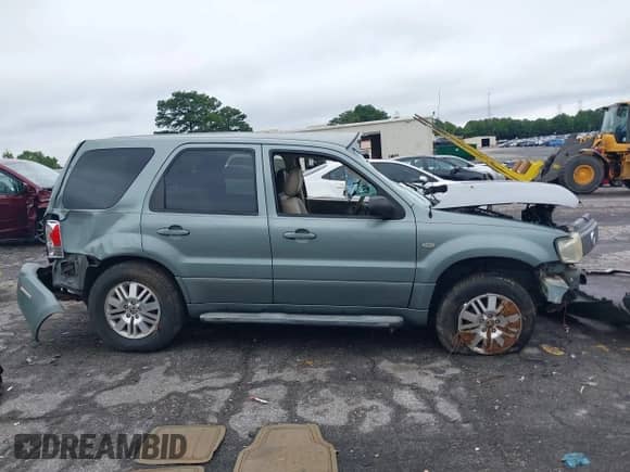 2006 Mercury Mariner Luxury with VIN 4M2YU57196KJ01063, listed as a IAAI auction lot 42907986 with Not provided miles and . Bid and sale history available at DreamBid. Image 13.
