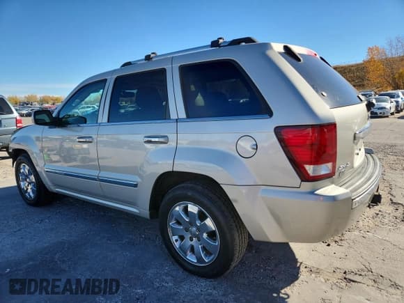 ✅ 2009 Jeep Grand Cherokee • VIN: 1J8HR68T69C520847 • Lot: 89548155. Listed on Copart with 322,340 mi. Free auction sales archive from the USA and detailed vehicle history report at DreamBid. Image 2.