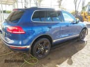 ✅ 2017 Volkswagen Touareg Wolfsburg Edition • VIN: WVGRF7BP5HD003047 • Lot: 43490757. Listed on IAAI with 146,324 mi. Free auction sales archive from the USA and detailed vehicle history report at DreamBid. Image 4.