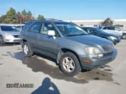 ✅ 2000 Lexus RX 300 • VIN: JT6GF10U0Y0070882 • Лот: 43809034. Опубликован ранее на IAAI с пробегом 165 627 миль. Бесплатный доступ к архиву аукционных продаж из США и подробный отчёт об истории автомобиля на DreamBid. Изображение 1.