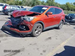 2018 Hyundai Santa Fe 2.4L z VIN 5XYZU3LB8JG523000, wystawiony jako IAAI lot #43263685 z przebiegiem 96 480 mil mil oraz . Historia ofert i sprzedaży dostępna na DreamBid. Obrazek 2.