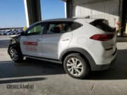 ✅ 2021 Hyundai Tucson SE • VIN: KM8J2CA47MU296355 • Lot: 82646715. Listed on Copart with 113,557 mi. Free auction sales archive from the USA and detailed vehicle history report at DreamBid. Image 2.