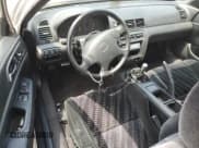 ✅ 1999 Honda Prelude • VIN: JHMBB614XXC010856 • Lot: 64548265. Wystawiony na Copart z przebiegiem 232 418 mil. Bezpłatny archiwum sprzedaży aukcyjnych z USA i szczegółowy raport historii pojazdu na DreamBid. Zdjęcie 8.