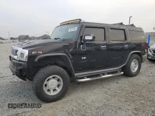 ✅ 2003 Hummer H2 • VIN: 5GRGN23U03H137888 • Lot: 90076345. Listed on Copart with 232,599 mi. Free auction sales archive from the USA and detailed vehicle history report at DreamBid. Image 1.