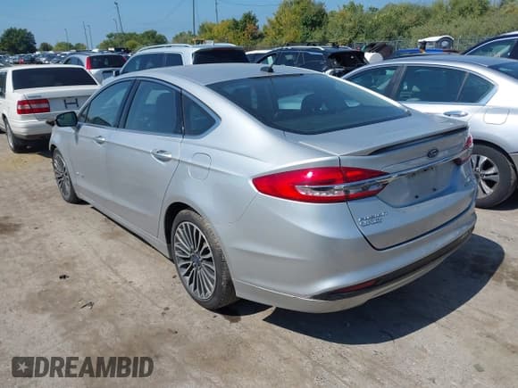 ✅ 2017 Ford Fusion Hybrid Titanium • VIN: 3FA6P0RU4HR387052 • Лот: 43191238. Опубликован ранее на IAAI с пробегом 204 571 миль. Бесплатный доступ к архиву аукционных продаж из США и подробный отчёт об истории автомобиля на DreamBid. Изображение 3.
