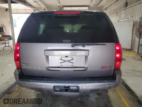 ✅ 2012 GMC Yukon XL SLT • VIN: 1GKS2KE74CR256764 • Lot: 63197125. Listed on Copart with 209,616 mi. Free auction sales archive from the USA and detailed vehicle history report at DreamBid. Image 6.
