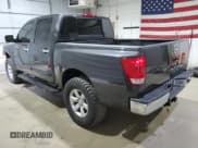 ✅ 2010 Nissan Titan SE • VIN: 1N6AA0EJ8AN318615 • Lot: 67966485. Listed on Copart with 120,411 mi. Free auction sales archive from the USA and detailed vehicle history report at DreamBid. Image 2.