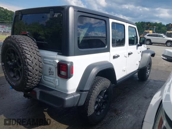 ✅ 2023 Jeep Wrangler • VIN: 1C4JJXN67PW630869 • Lot: 42170206. Wystawiony na IAAI z przebiegiem 56 384 mil. Bezpłatny archiwum sprzedaży aukcyjnych z USA i szczegółowy raport historii pojazdu na DreamBid. Zdjęcie 4.
