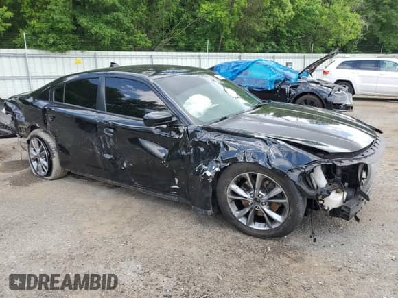 2021 Dodge Charger SXT с VIN 2C3CDXJG8MH505988, выставлен на аукционе Copart как лот 54204505 с пробегом 120 912 миль миль и Списание • Salvage title. История ставок и продаж доступна на DreamBid. Изображение 4.