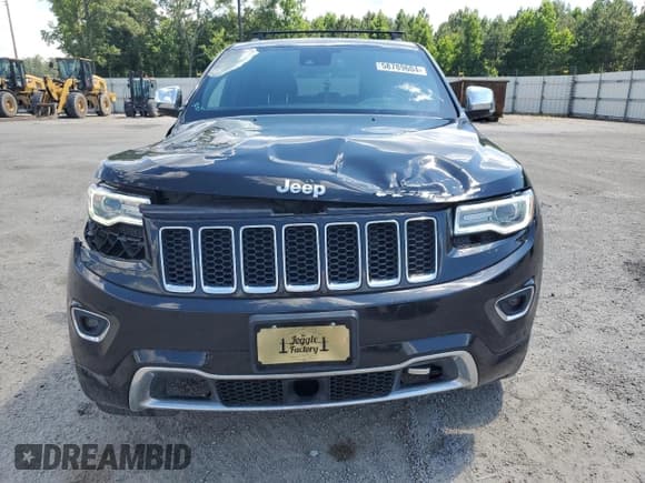 ✅ 2016 Jeep Grand Cherokee Overland • VIN: 1C4RJFCM9GC302353 • Лот: 58789604. Опубликован ранее на Copart с пробегом 87 826 миль. Бесплатный доступ к архиву аукционных продаж из США и подробный отчёт об истории автомобиля на DreamBid. Изображение 5.