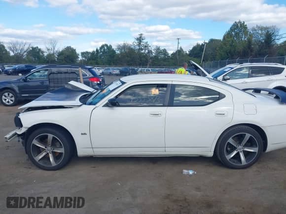 2009 Dodge Charger SXT с VIN 2B3KA33V69H619856, выставлен на аукционе IAAI как лот 43353873 с пробегом Не указан миль и . История ставок и продаж доступна на DreamBid. Изображение 14.