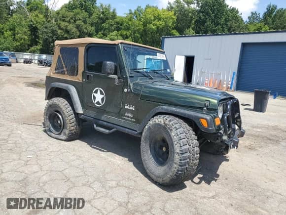 2005 Jeep Wrangler X с VIN 1J4FA39S45P319326, выставлен на аукционе Copart как лот 64983495 с пробегом 156 551 миль миль и Списание • Salvage title. История ставок и продаж доступна на DreamBid. Изображение 4.